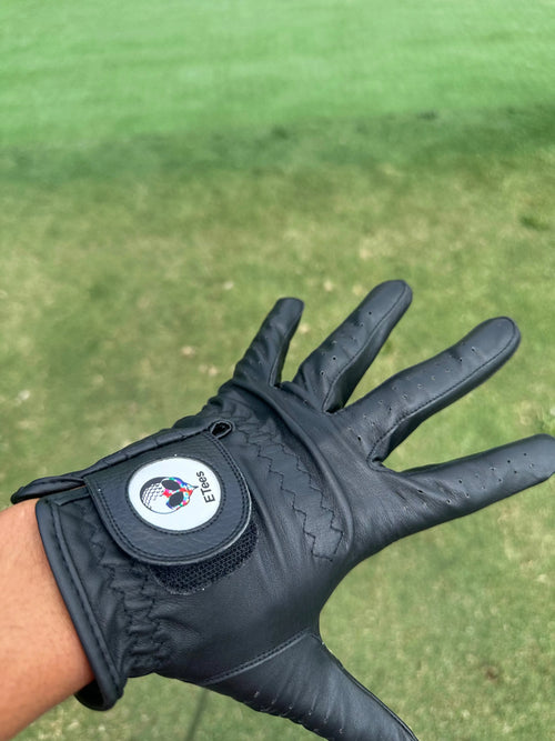 Golf Glove Black Golf Glove Premium golf glove with cabretta leather finish. Left-hand white golf glove with textured grip. Right hand white Golf Glove with textured grip.